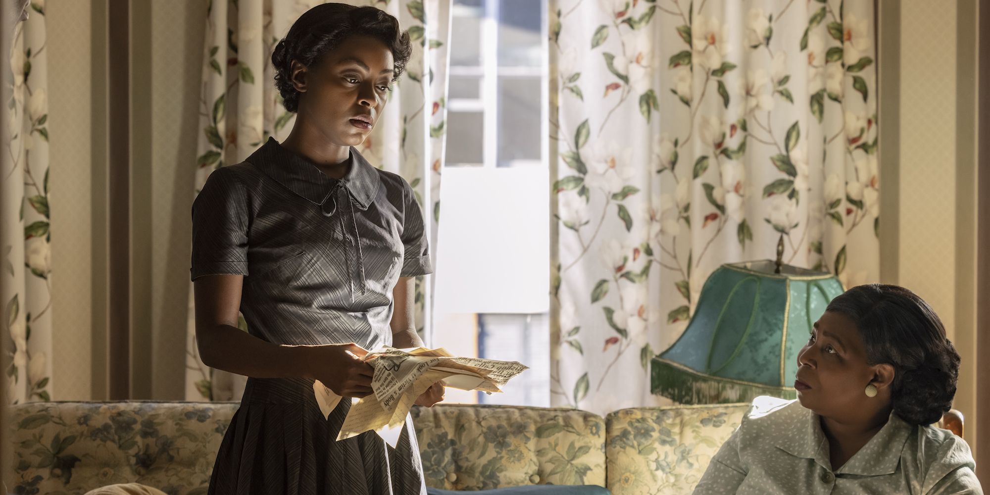 Mamie Till looking shocked while holding several papers in Till 2022