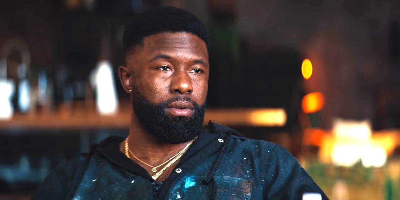 Trevante Rhodes as Zyair Malloy looking at a person off screen in Netflix's Mea Culpa