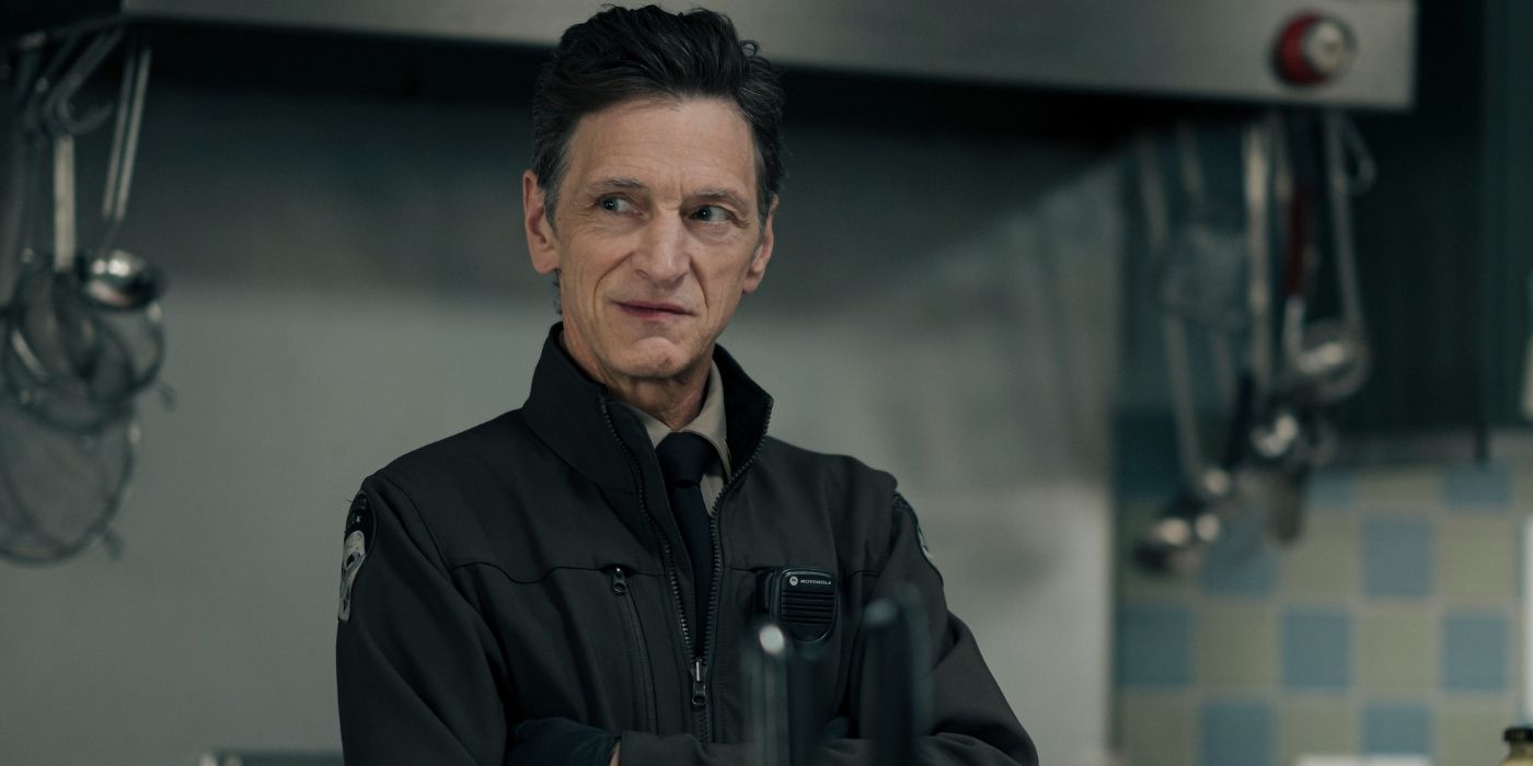 John Hawkes looking at something in True Detective: Night Country