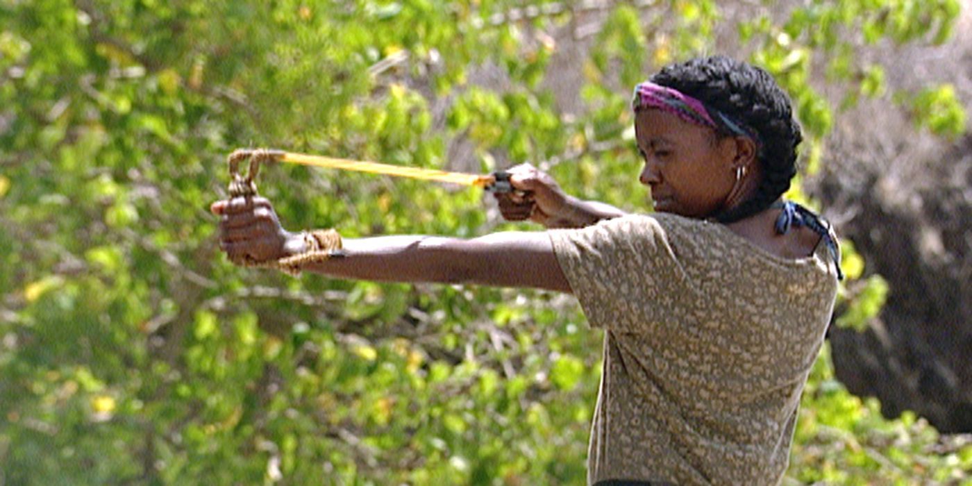 Survivor Season 4 Winner Vecepia Towery with a bow and arrow