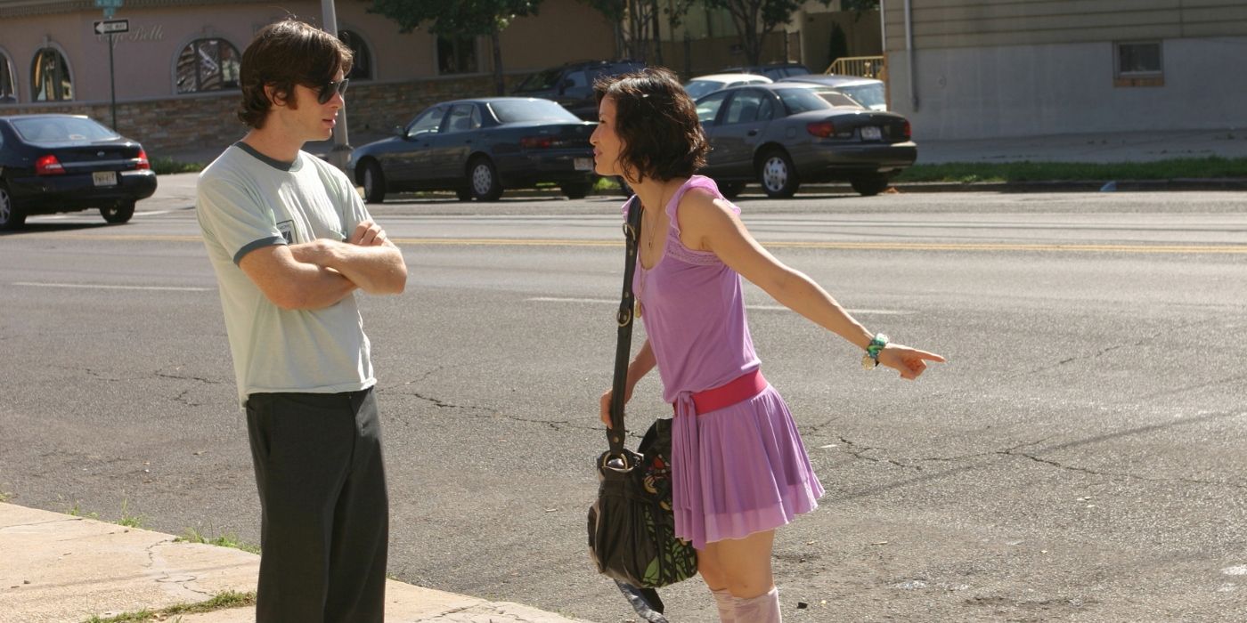 Neil and Violet, talking in the street in Watching the Detectives
