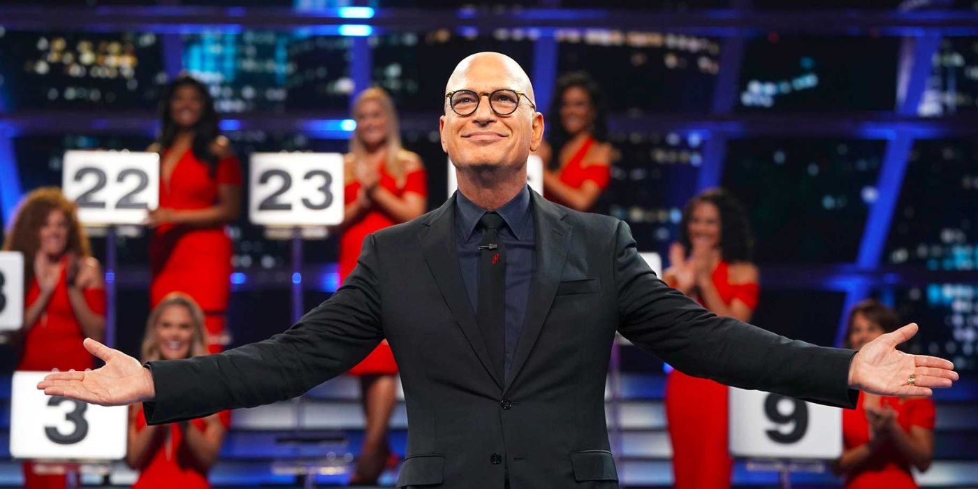 Deal or No Deal Howie Mandel with arms and hands open