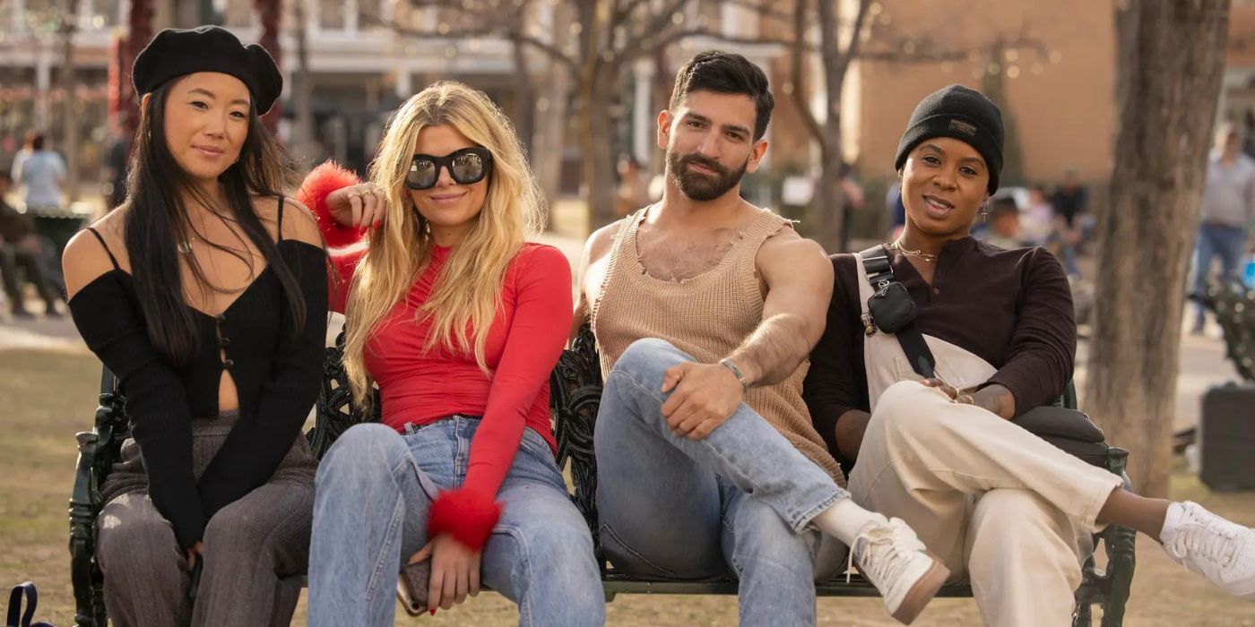 The main cast of Swiping America sitting on a bench in New York City