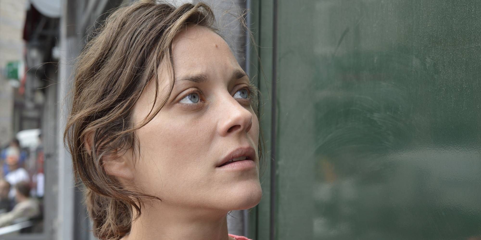 A close-up shot of Marion Cotillard looking up in Two Days, One Night.