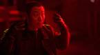 Lee Hee-joon in a red lit room as Song Chon in A Killer Paradox