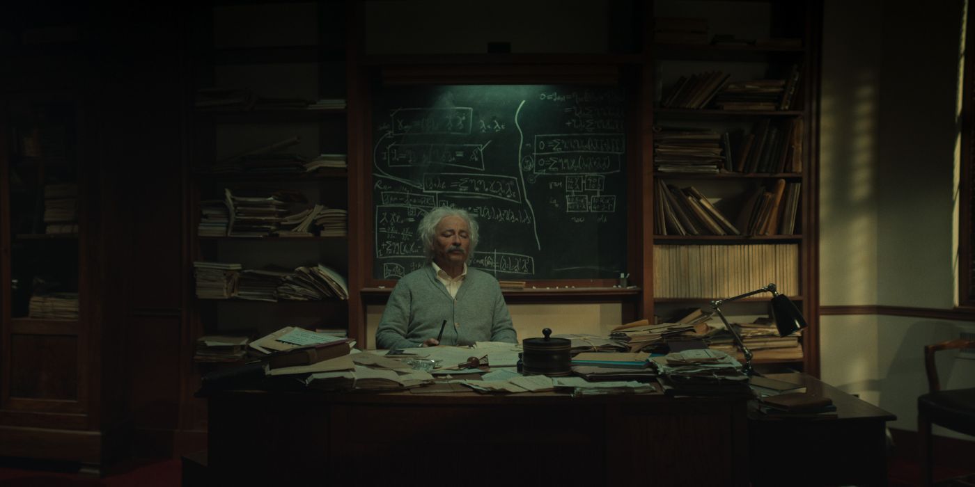 Aidan McArdle as Albert Einstein, working in his office, in Einstein and the Bomb.