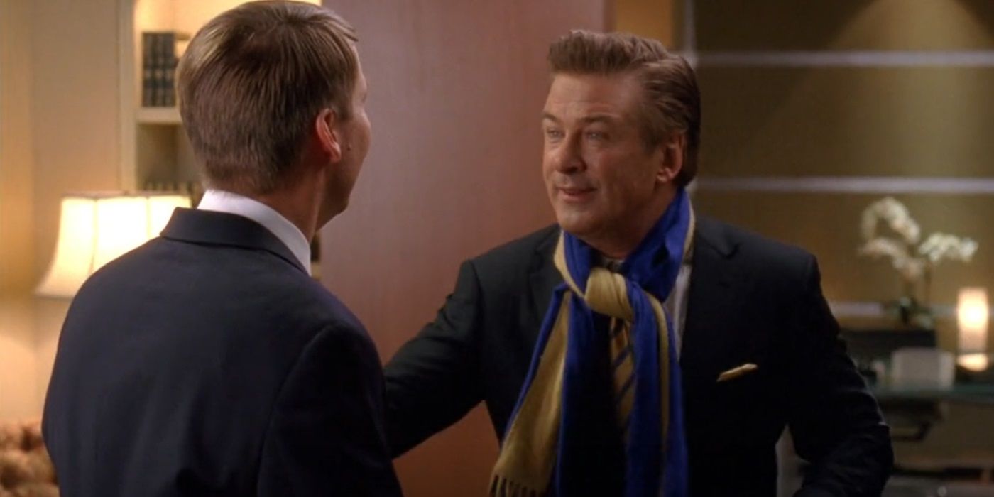 Alec Baldwin as Jack Donaghy talking to Jack McBrayer as Kenneth in 30 Rock