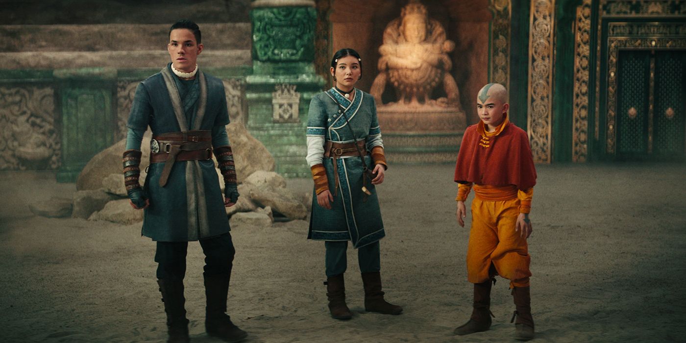 Gordon Cormier as Aang, Ian Ousley as Sokka, and Kiawentiio as Katara standing side-by-side in Avatar the Last Airbender