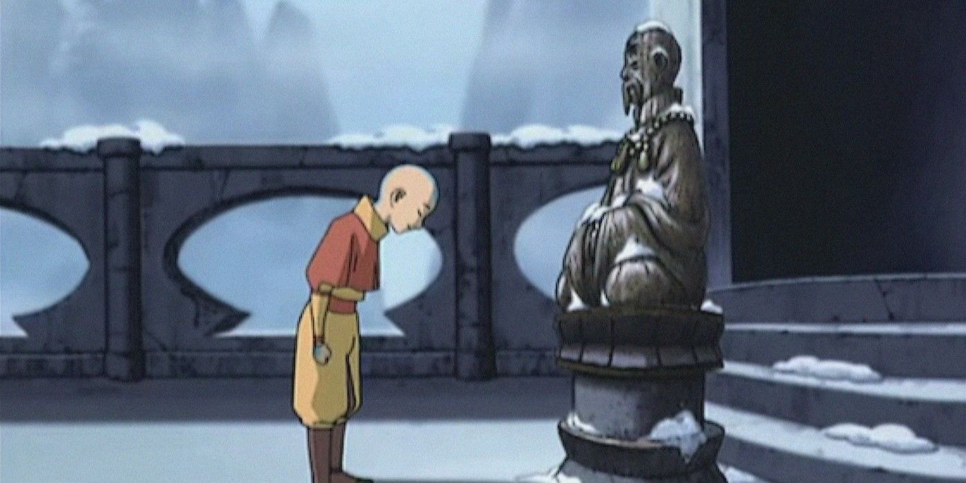 Aang pays respect to Monk Gyatso's statue.
