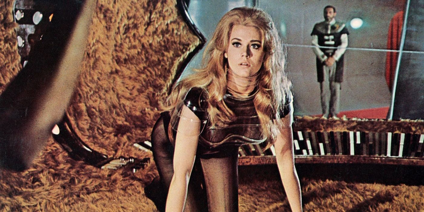 Jane Fonda as Barbarella, on her hands and knees looking concerned in Barbarella