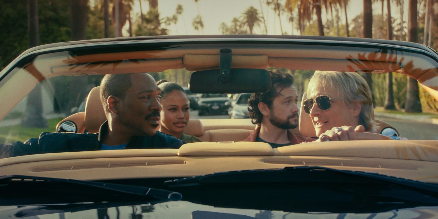 Eddie Murphy, Bronson Pinchot, Taylour Paige, and Joseph Gordon-Levitt, riding in a convertible in Beverly Hills Cop: Axel F.