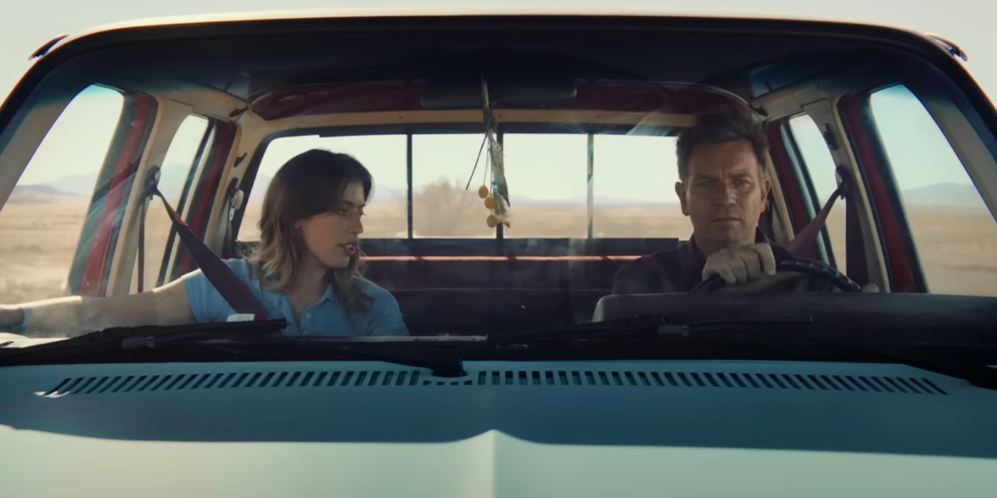 Clara and Ewan McGregor riding in a car together in Bleeding Love.