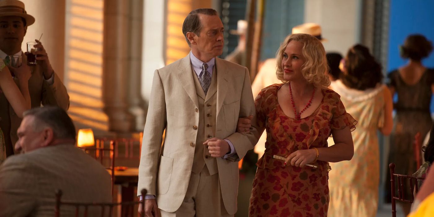 Steve Buscemi as Nucky Thompson walking with Patricia Arquette as Sally Wheet in Boardwalk Empire