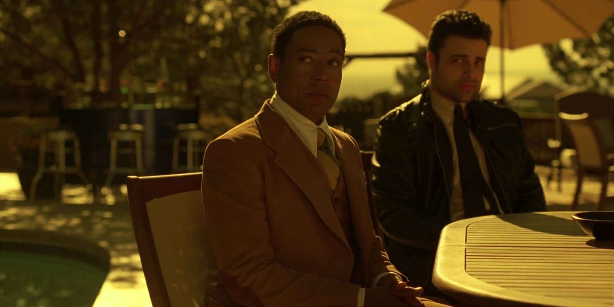 Giancarlo Esposito as Gustavo Fring and James Martinez as Max in Breaking Bad 