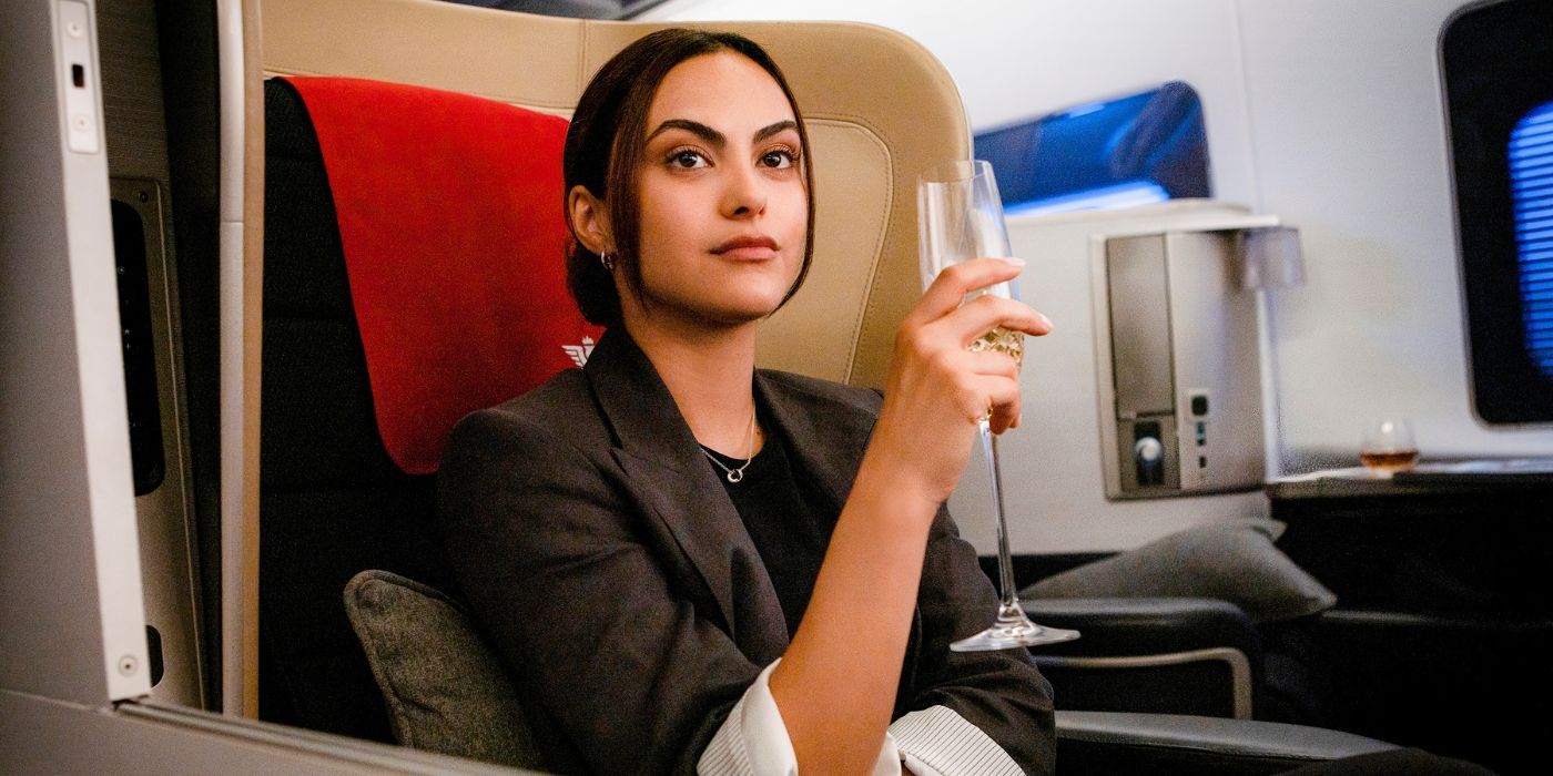 Camila Mendes sitting in a first class seat in Upgraded