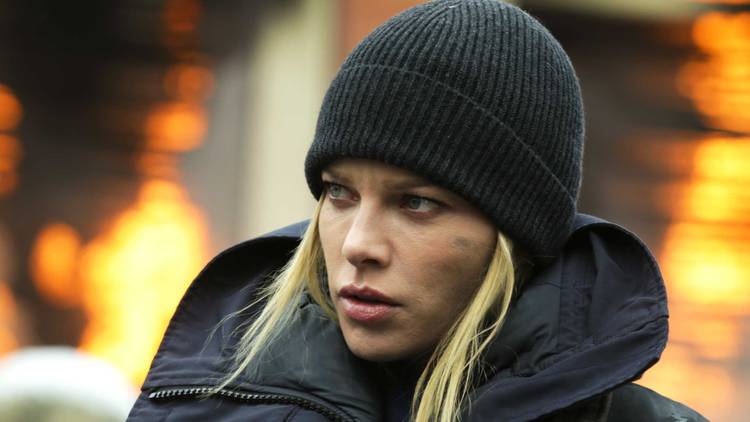 A firefighter with a hat on