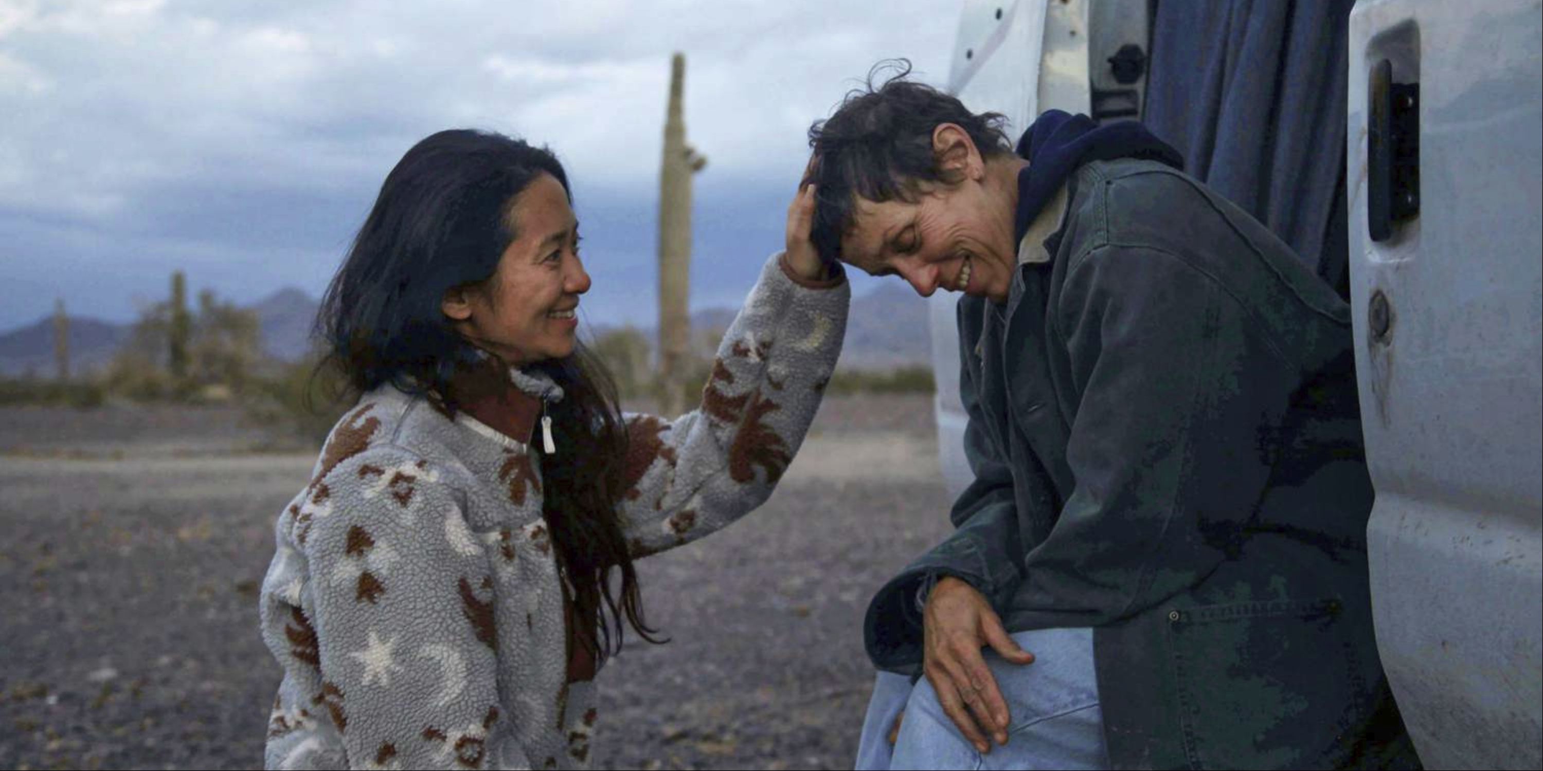 Chloe Zhao touching Frances McDormand's head on the set of Nomadland