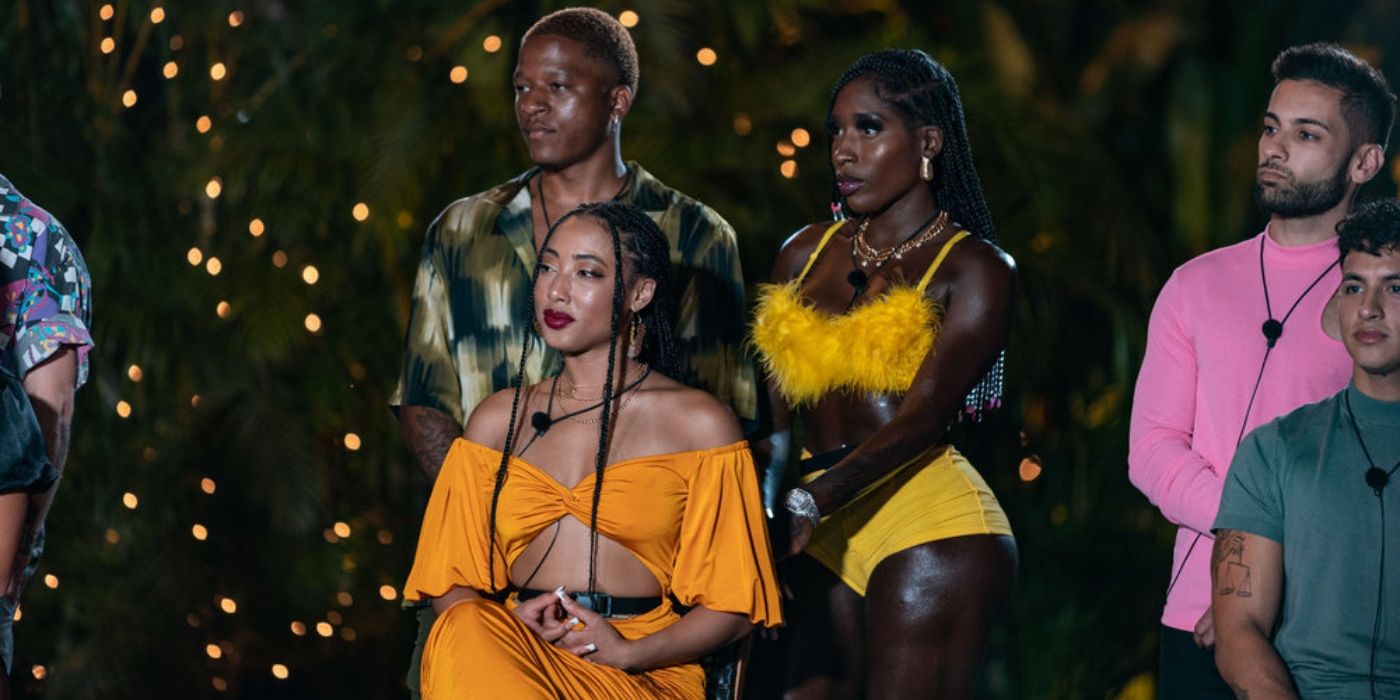 Sean William and Brittne Babe stand behind the seated Sanu Stevens on 'Couple to Throuple'