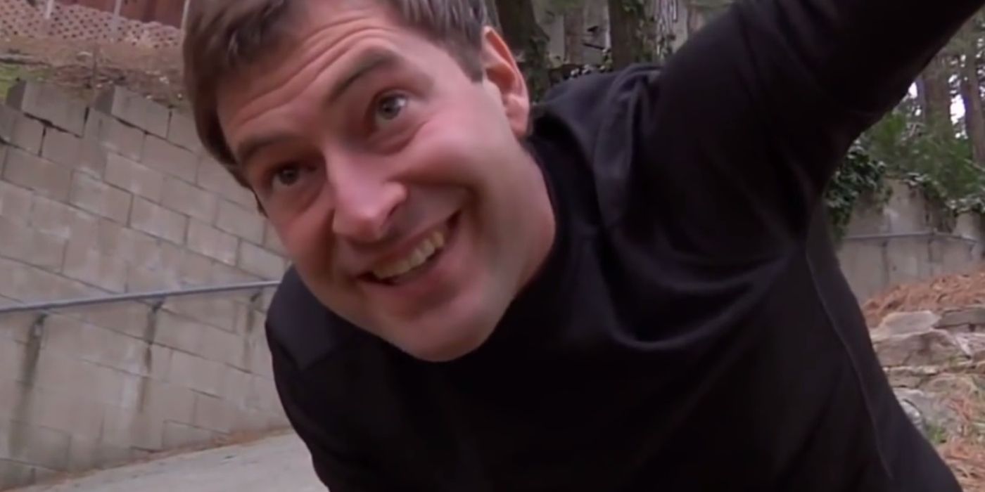 Josef smiles at the camera in the film Creep