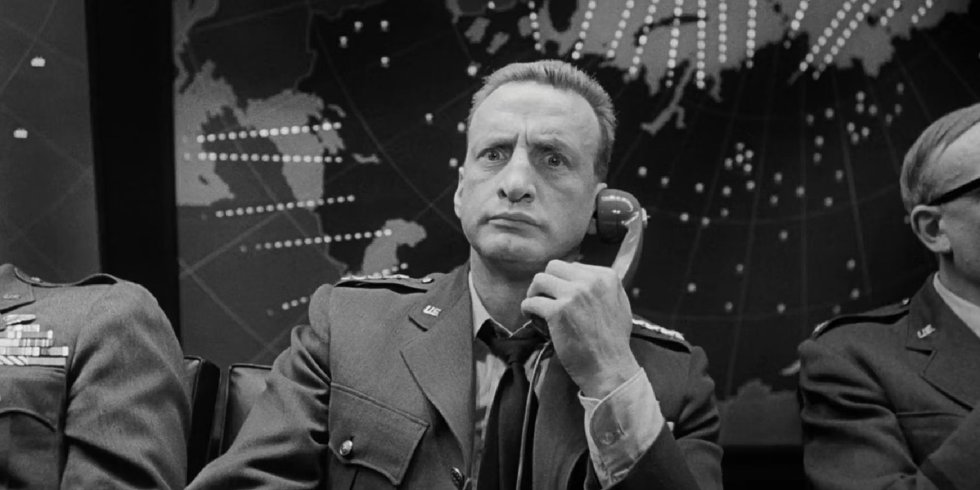 George C Scott as General "Buck" Turgidson on the phone concerningly in Dr Strangelove