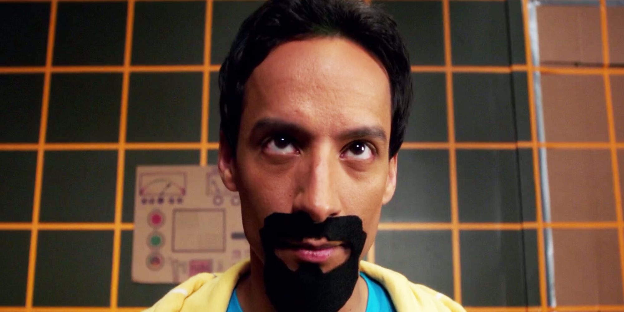 Abed (Danny Puddi) as Evil Abed, wearing a goatee, looking sinister
