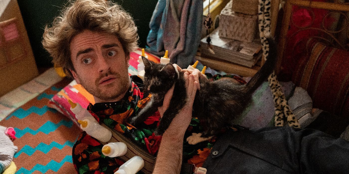 First look at Luke Rollason in 'Extraordinary' in Season 2 holding a cat and milk bottles