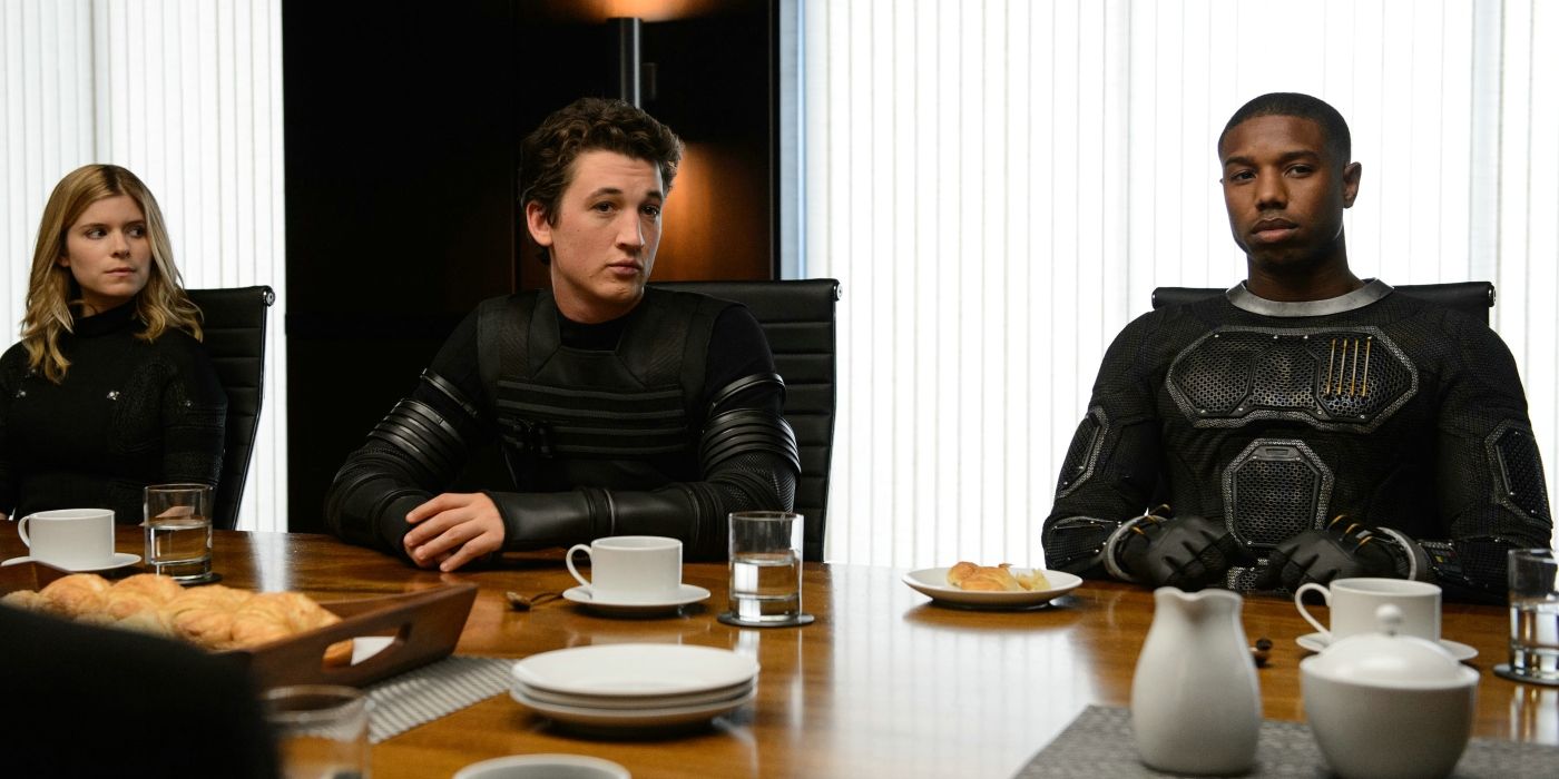 Kate Mara, Miles Teller, and Michael B. Jordan as Sue Storm, Reed Richards, and Johnny Storm looking serious in a meeting in Fantastic Four