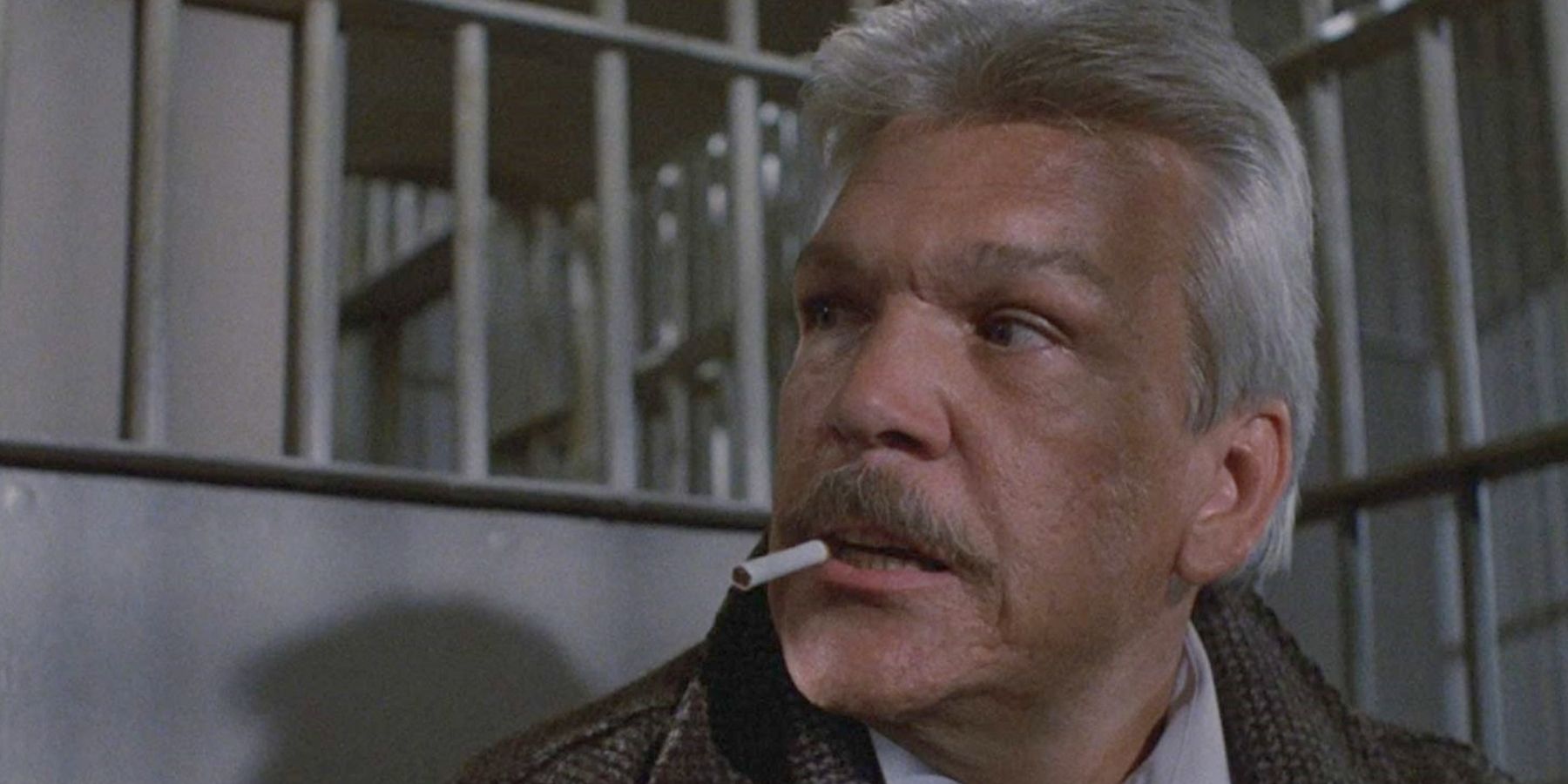 close up of Frank McRae (Tom Atkins) with a cigarette in Maniac Cop