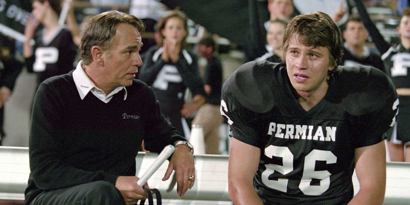 Billy Bob Thornton as the Coach talks to Garrett Hedlund as Don during a football game in Friday Night Lights