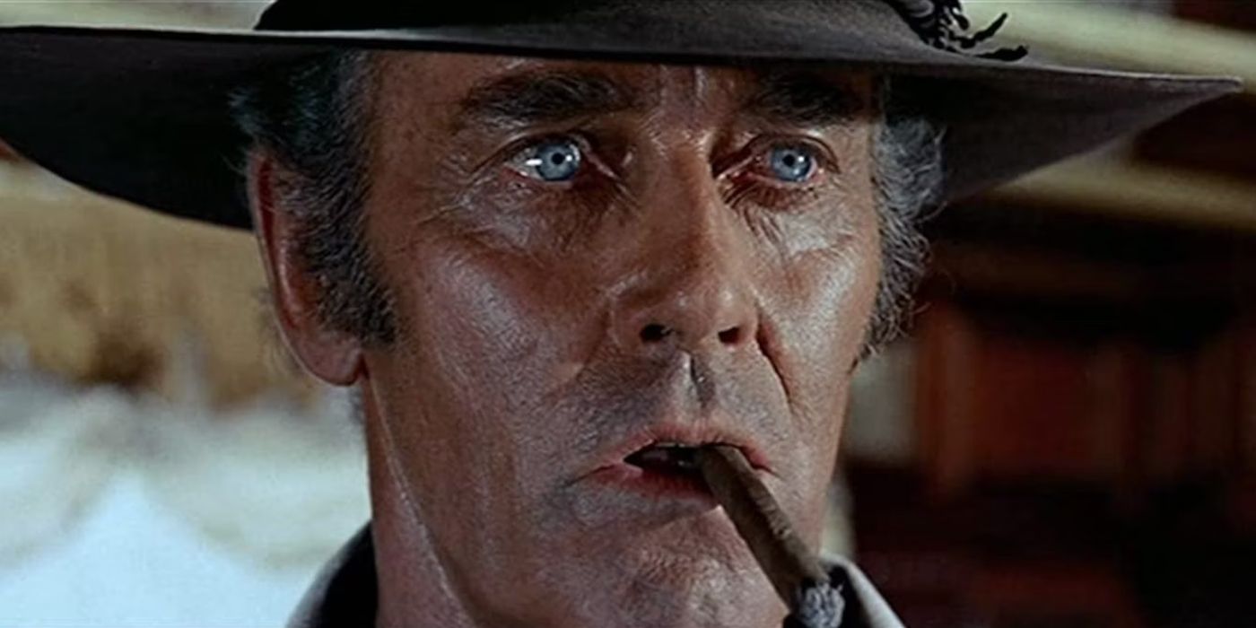 Henry Fonda as Frank, looking concerned with a cigar hanging out of his mouth in Once Upon a Time in the West