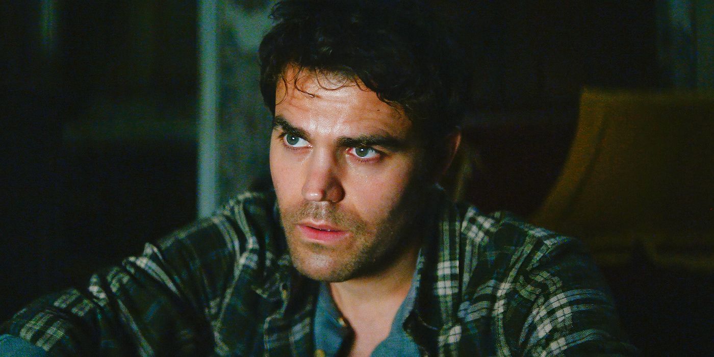 Paul Wesley staring ahead with concern in a still from History of Evil. 