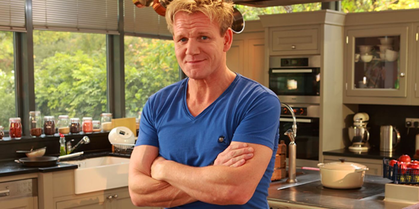 Gordon poses in his kitchen