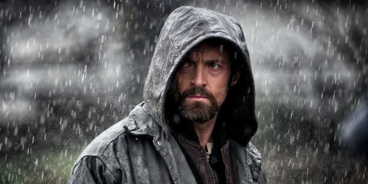 Hugh Jackman as Keller Dover standing in the rain in Denis Villeneuve's Prisoners