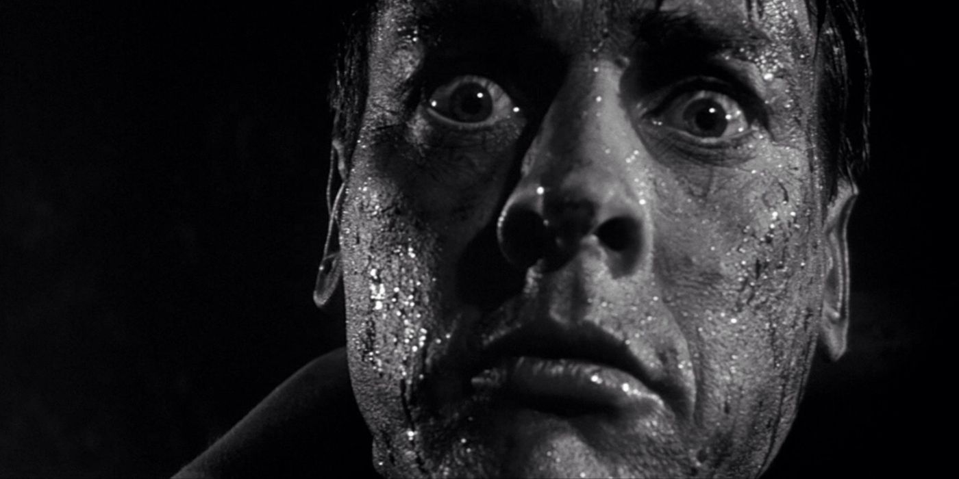 Dr. Miles J. Bennell, stares at the camera looking terrified in Invasion of the Body Snatchers