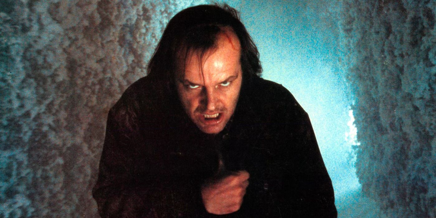 Jack Torrance standing outside in the cold and staring menacingly into the camera in The Shining