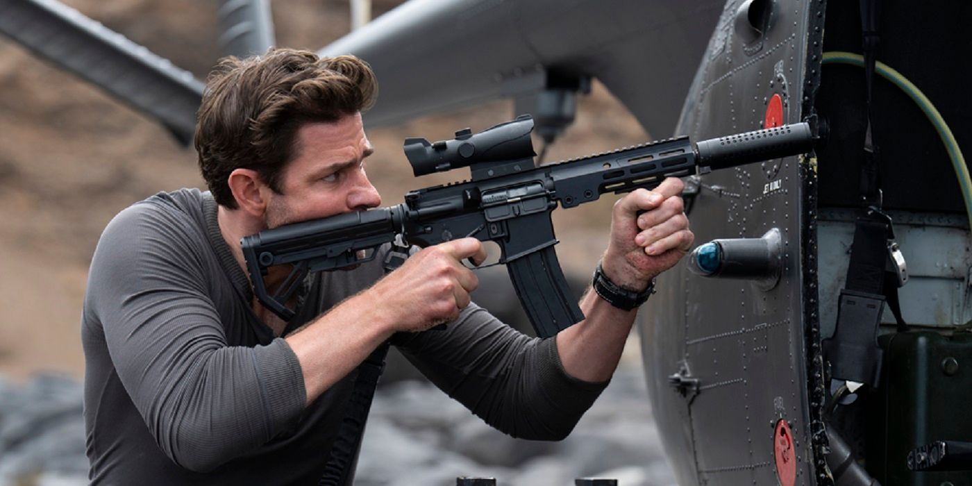 John Krasinski as Jack Ryan, aiming a rifle, in Tom Clancy's Jack Ryan