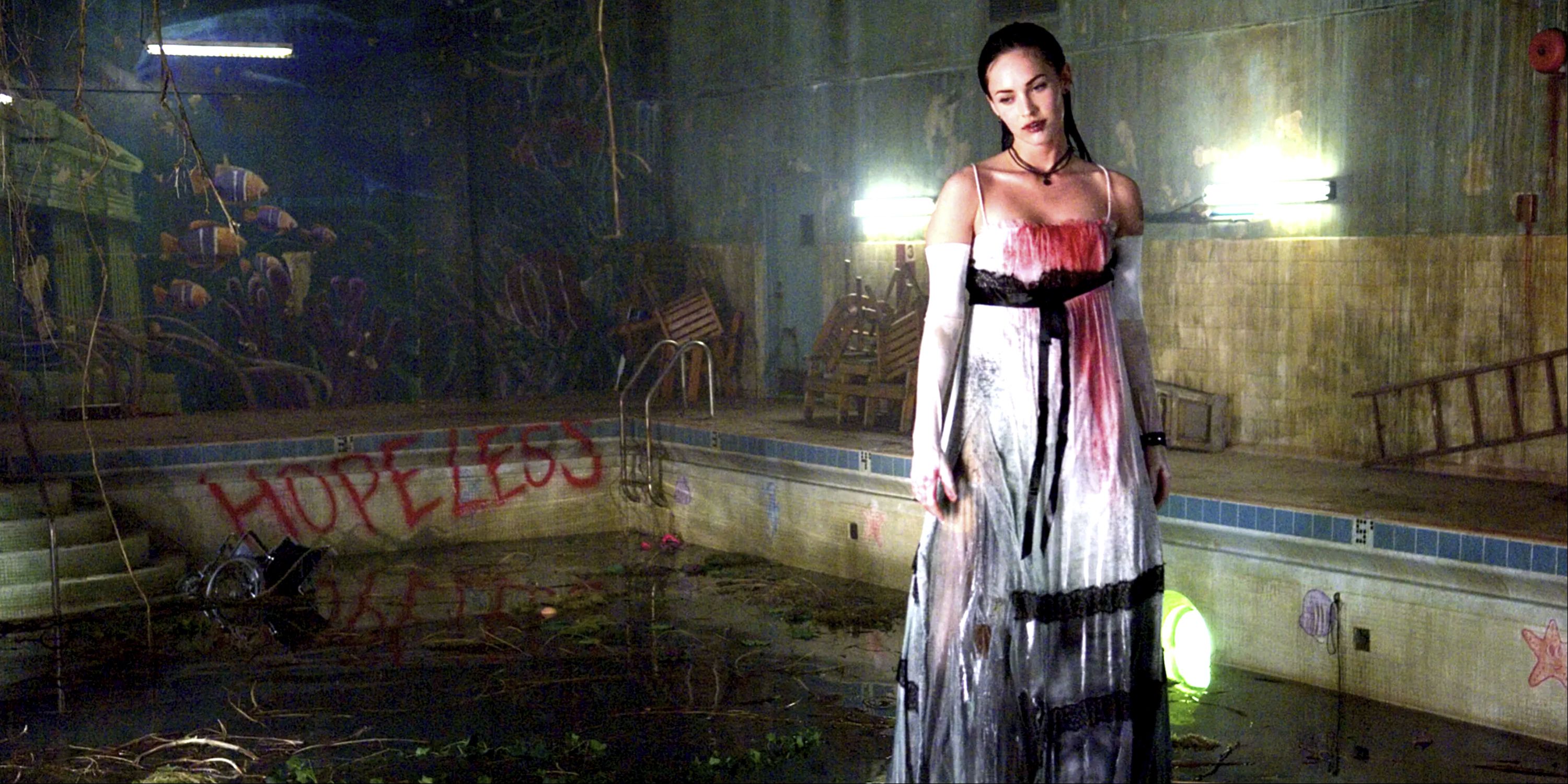 Megan Fox as Jennifer standing in a dirty pool in Jennifer's Body.
