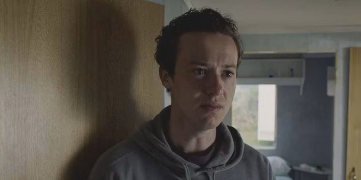 Joseph Quinn as Tom looking frightened in Make Up