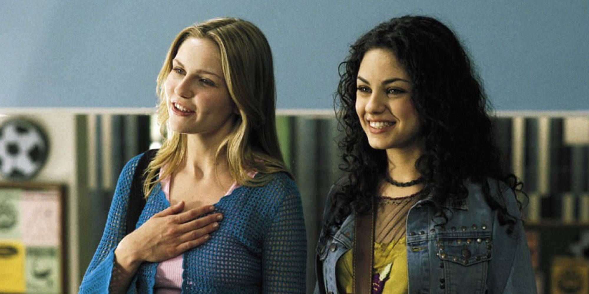 Kirsten Dunst and Mila Kunis standing side by side and smiling in Get Over It.