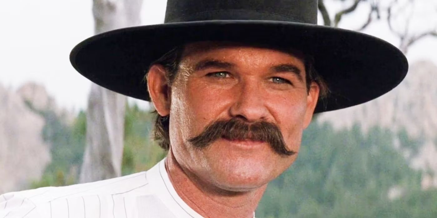 Close up of actor Kurt Russell as Wyatt Earp, smiling in Tombstone