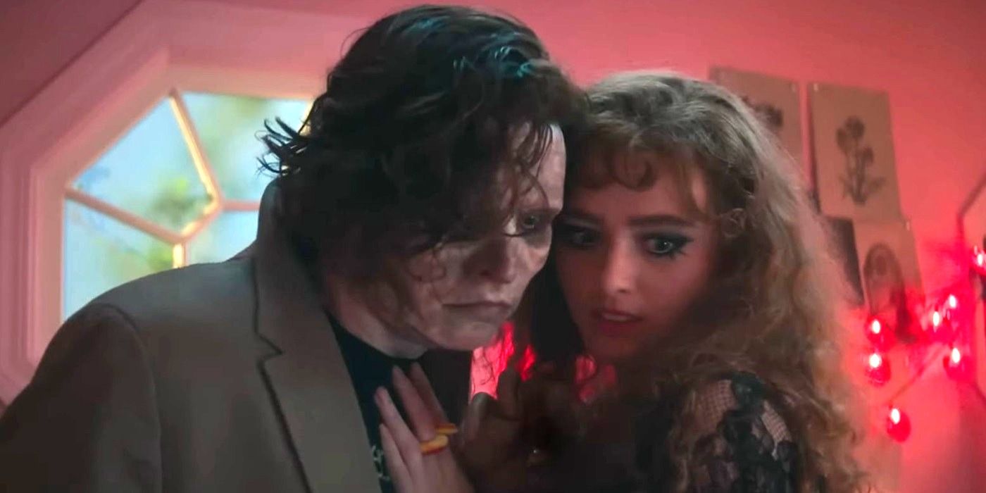 Kathryn Newton holding on to a decaying Cole Sprouse in Lisa Frankenstein