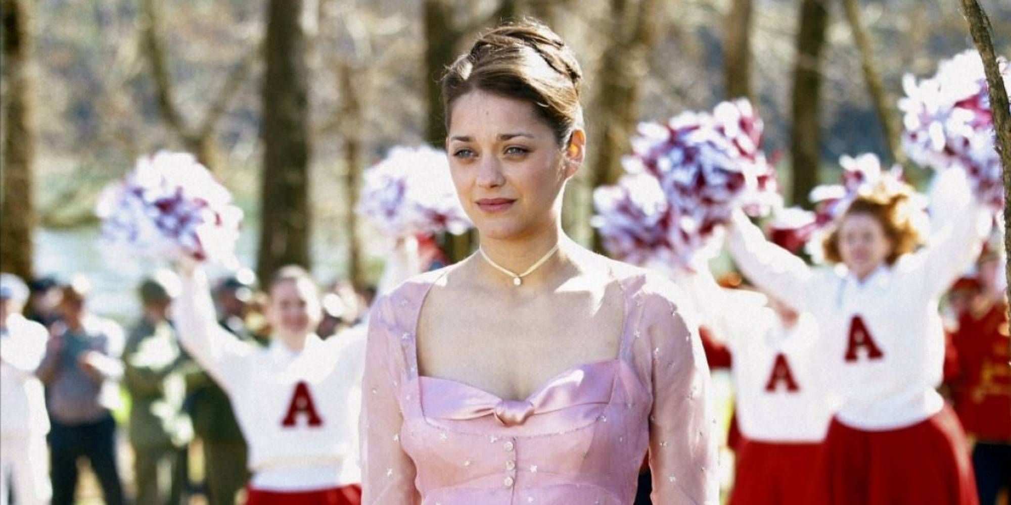Marion Cotillard in Big Fish surrounded by cheerleaders.