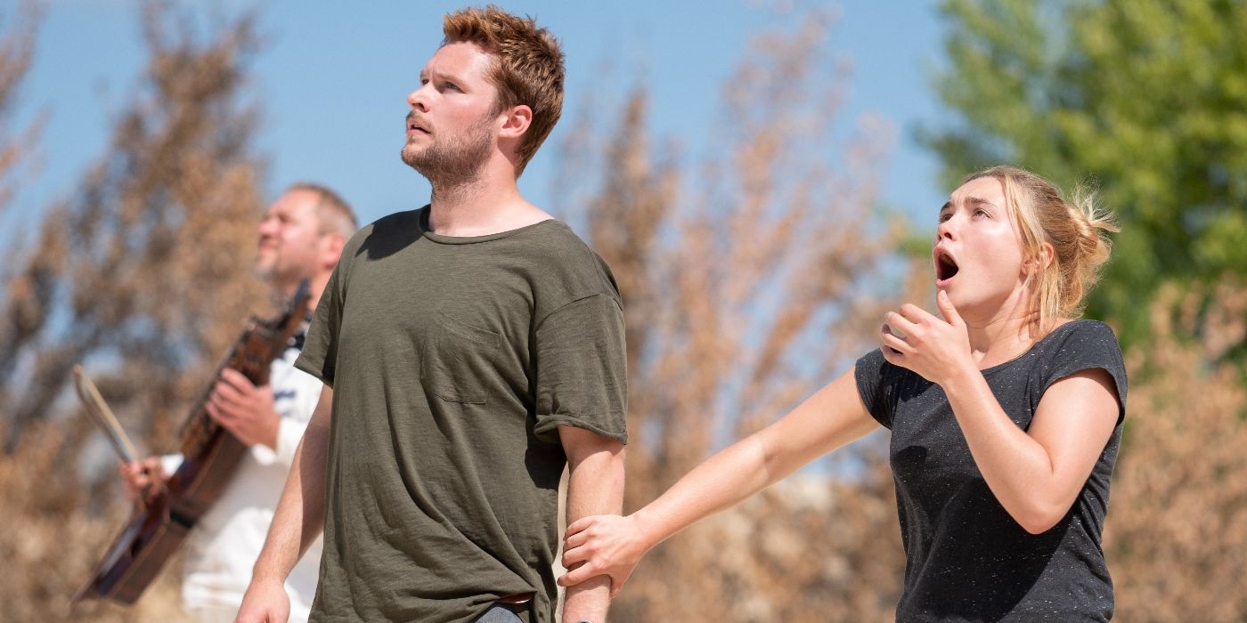 Christian and Dani watching horrified during the ättestupa ceremony in Midsommar