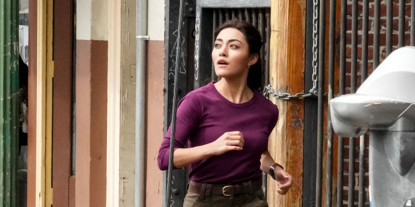 Yasmine Al-Bustami running down the street as Lucy Tara in NCIS: Hawai'i