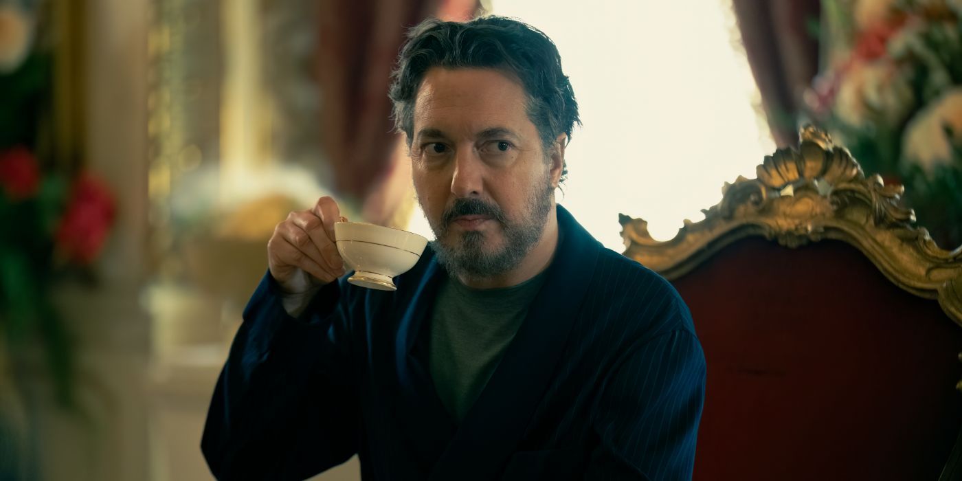 Guillaume Gallienne looks worried as he drinks tea in 'The Régime'