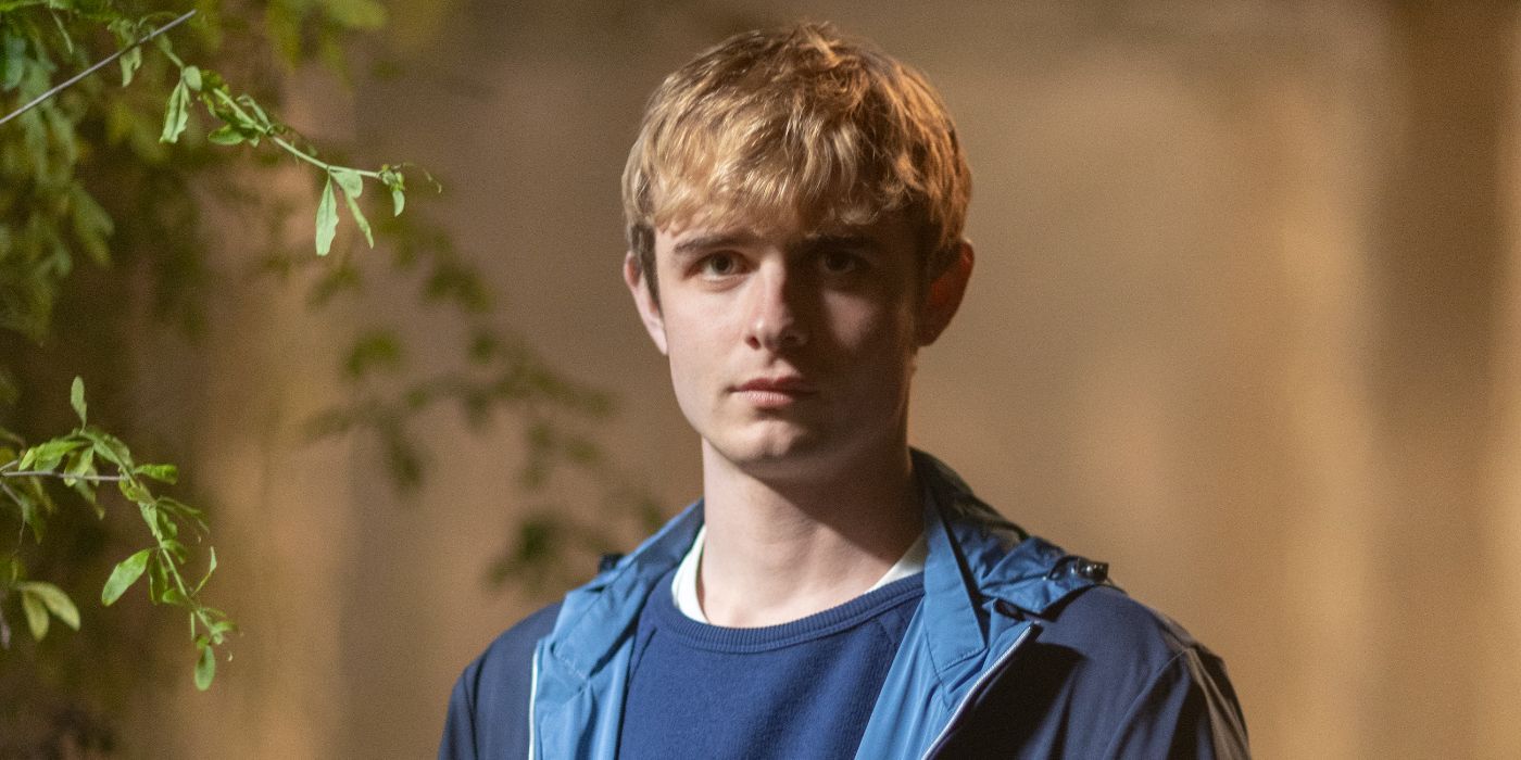Otto Farrant wears a blue shirt/jacket combo in a promo shot for 'Alex Rider' S3