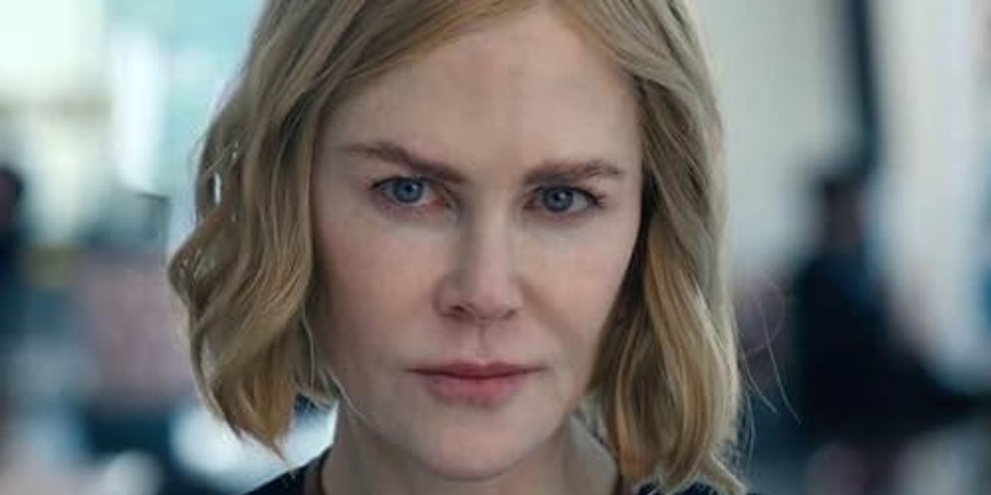Nicole Kidman with short blonde hair looking straight into the camera in 'Expats' closeup shot.