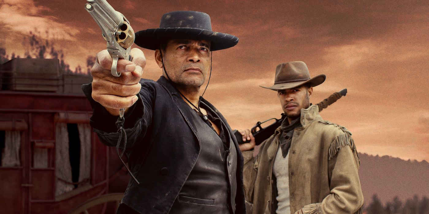 Mario Van Peebles as Chief and Mandela Van Peebles Decker standing in front of a stagecoach while the former points a gun off at something in the distance in Outlaw Posse.  