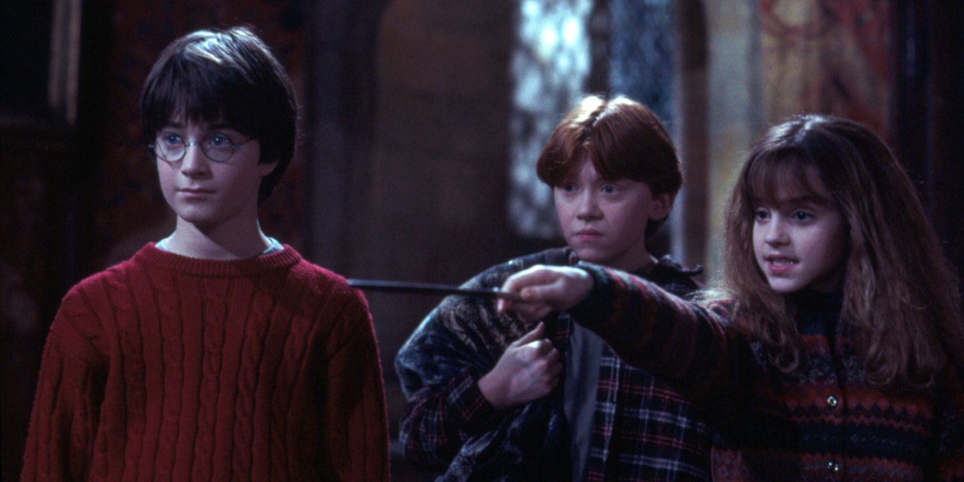 Hermione Granger casts a spell while Harry and Ron watch on surprised. 