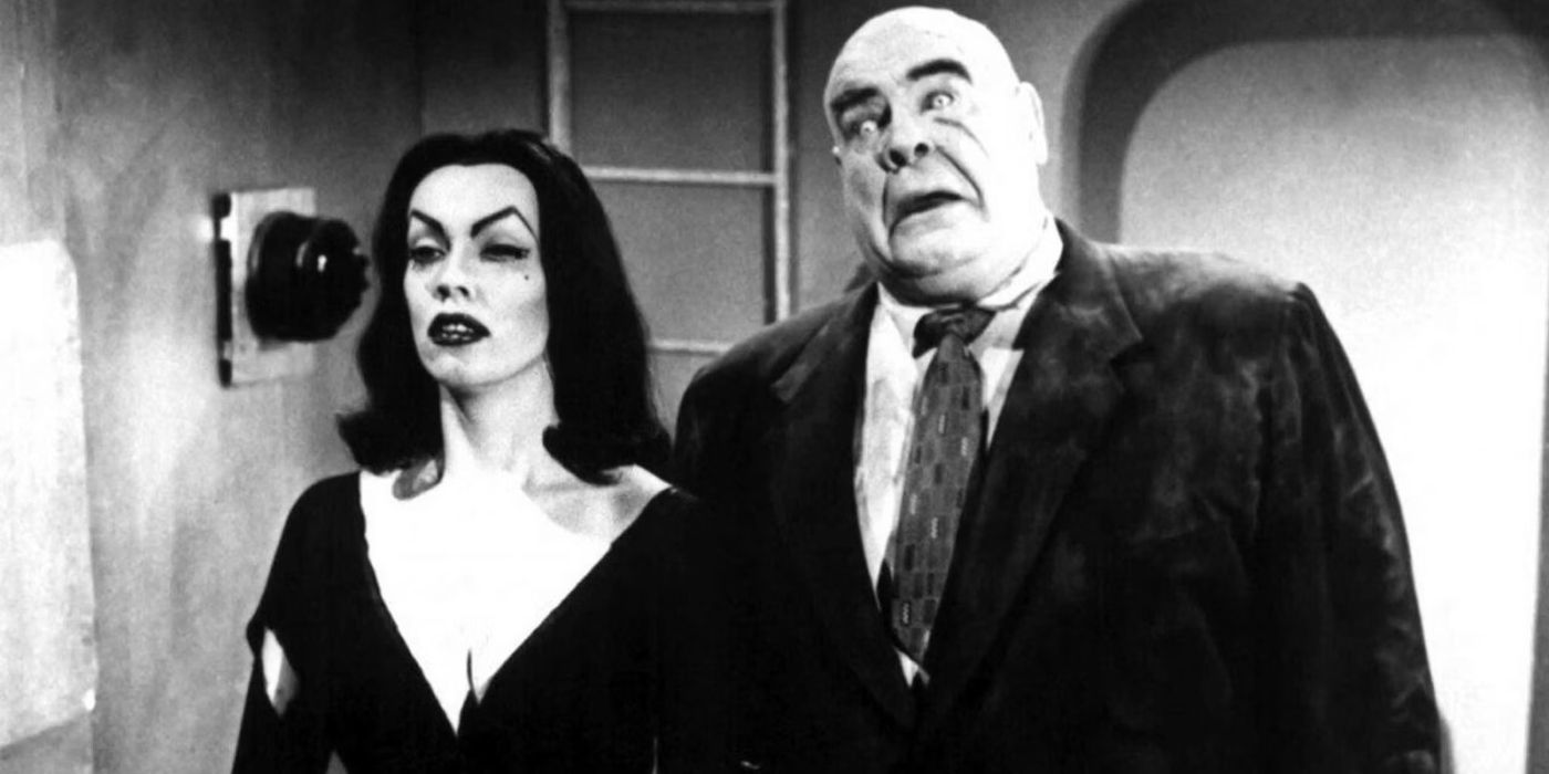 A man and a woman standing next to each other in Plan 9 From Outer Space (1)